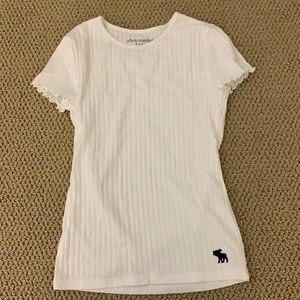 green and white shirts with fringe sleeves!!